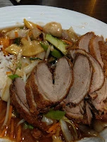 Knusprige Ente Mit Gemüse Und Reis